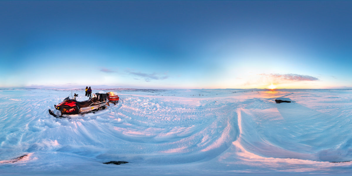 Sunset in nearby fells by snowmobile. Nuorgan. Finland