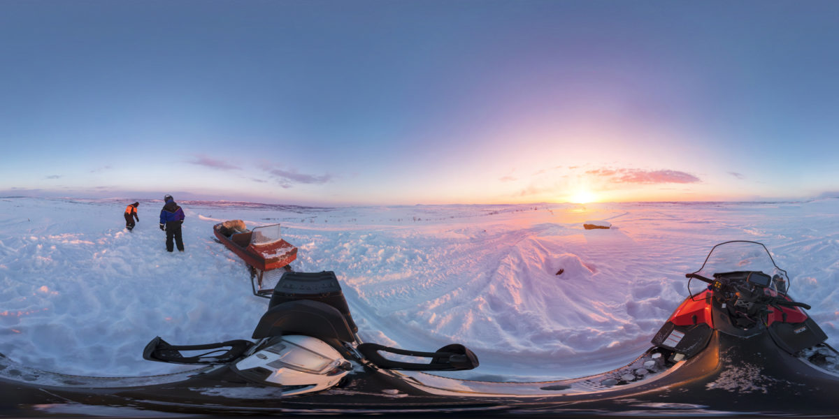 Sunset in nearby fells by snowmobile. Nuorgan. Finland