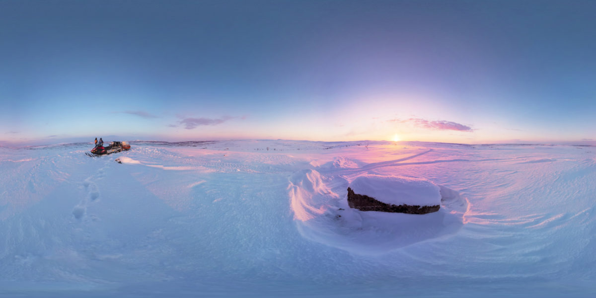Sunset in nearby fells by snowmobile. Nuorgan. Finland