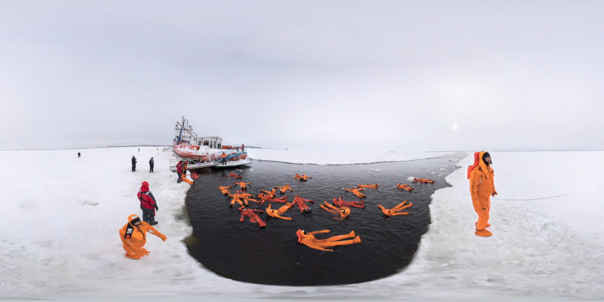 The tourist enjoying in the artic water of Gulf of Bothnia. Sweden