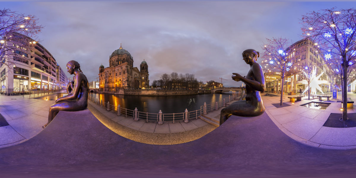 Three Girls One Boy Statue and Berlin Cathedral in Christmas. Berlin. Germany
