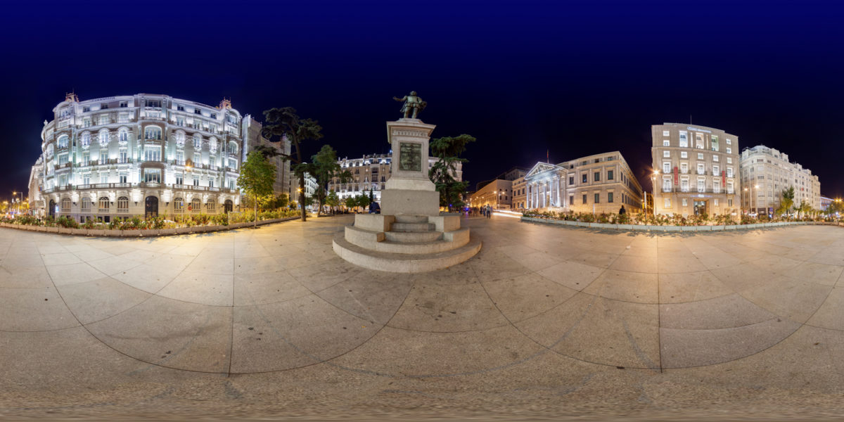 statue of cervantes and Spanish Congress of Deputies in plaza de las cortes. Madrid